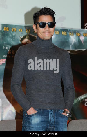 Hong Kong Sänger und Schauspieler Aaron Kwok stellt während einer Konferenz für chinesische Filme in Hong Kong, China, 22. Januar 2014. Stockfoto