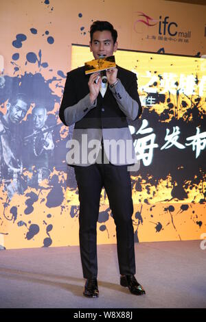 Taiwanesische Schauspieler Eddie Peng spricht während einer Pressekonferenz zu seinem neuen Film 'Aufstieg der Legende" in Shanghai, China, 24. November 2014. Stockfoto