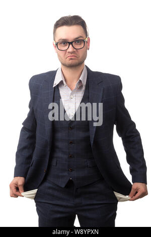 Junge Unternehmer mit leeren Taschen auf weißem Hintergrund Stockfoto