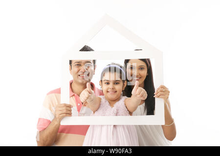 Familie Halterahmen Traumhauses Stockfoto