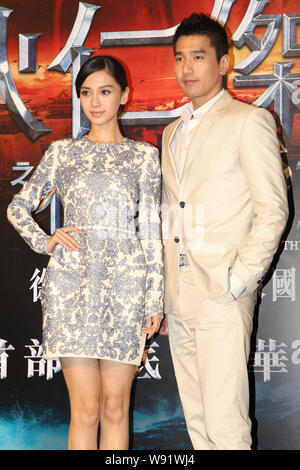 Hong Kong Schauspielerin Angelababy, Links, und taiwanesischen Schauspieler Mark Chao Pose während der Premiere ihres neuen Films, Junge Detective Dee: Anstieg des Meeresspiegels Dr Stockfoto