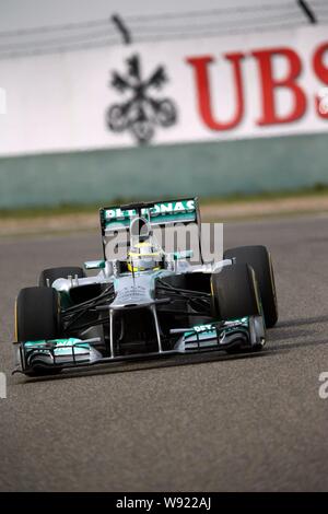 Deutschen F1-Fahrer Nico Rosberg Mercedes konkurriert im Qualifying des 2013 Formula One Grand Prix von China auf dem Shanghai International Stockfoto