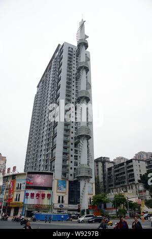 Blick auf eine Rakete-förmigen Gebäude in Nanning, China Guangxi Zhuang autonomen Region, 18. November 2013. Ein Gebäude in Nanning, China Gu Stockfoto