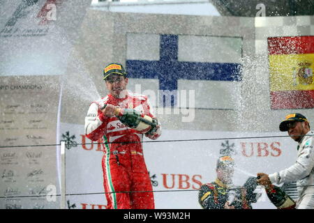 (Von links) Spanisch F1-Pilot Fernando Alonso von Ferrari, Finnische F1 Fahrer Kimi Räikkönen von Lotus und britischen F1-Pilot Lewis Hamilton Mercedes s Stockfoto