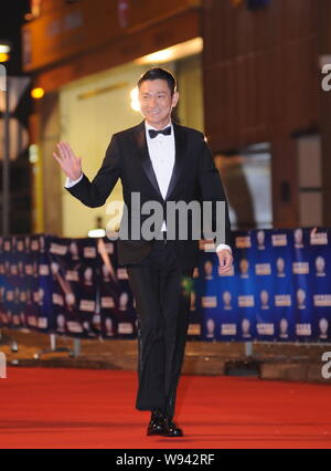 Hong Kong Schauspieler Andy Lau Posen auf dem roten Teppich an der Huading Auszeichnungen in Hongkong, China, 10. April 2013. Stockfoto