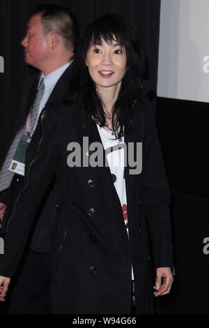 Hong Kong Schauspielerin Maggie Cheung Lächeln auf einer Pressekonferenz zum 50-jährigen Taipei Golden Horse Film Festival in Taipei, Taiwan, 21. November 2013. Stockfoto