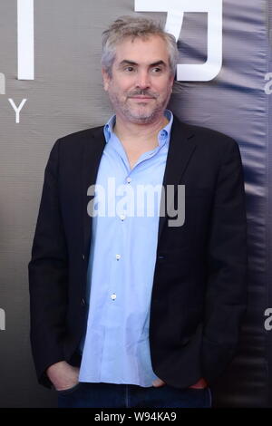 Mexikanischen Regisseur Alfonso Cuaron lächelt bei einer Pressekonferenz zur Premiere seines neuen Films, Schwerkraft, in Peking, China, 18. November 2013. Stockfoto