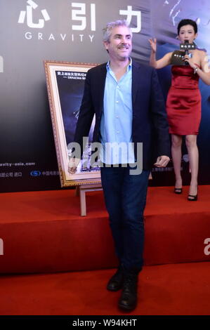 Mexikanischen Regisseur Alfonso Cuaron lächelt bei einer Pressekonferenz zur Premiere seines neuen Films, Schwerkraft, in Peking, China, 18. November 2013. Stockfoto