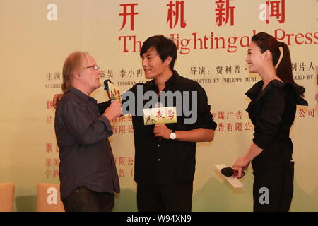 Der französische Regisseur Philippe Muyl (L), Chinesische Schauspieler Wang Hao (C) und Schauspielerin Li Xiaoran dargestellt, während einer Pressekonferenz für ihren neuen Film, die Ni Stockfoto