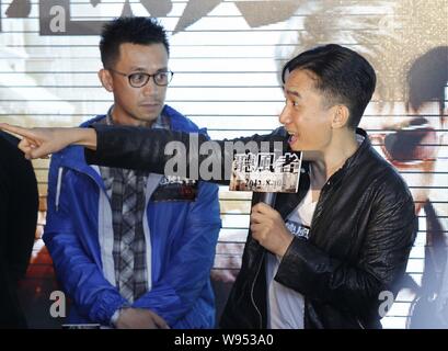 Hong Kong Schauspieler Tony Leung spricht auf der Pressekonferenz zu seinem neuen Film, der Slient Krieg, während dem 15. Shanghai International Film Festival in Sh Stockfoto