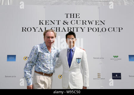 Hong Kong Sänger und Schauspieler Aaron Kwok (R) und englischen Komponisten Andrew Lloyd Webber darstellen, während die Kent & Gurwen Royal Charity Polo Cup in Hongkong, Stockfoto