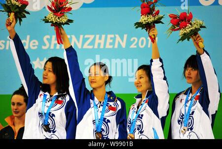 Chinesische Team holt Bronze Medaillen bei den Frauen 4 á 100 m Freistilstaffel während der 26 Sommer-universiade in Shenzhen, China Guangdong Provinz, Stockfoto
