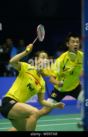 China Ma Jin und Xu Chen gegen Germanys Michael Fuchs und Birgit Michels im gemischten Doppel an der BWF badminton Sudirman Cup 20 konkurrieren Stockfoto