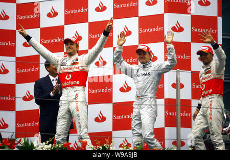 (Von links) Der britische F1 Jenson Button von McLaren Mercedes, deutschen Fahrer Nico Rosberg bei Mercedes GP und F1 Lewis Hamilton von McLaren Mercedes Stockfoto