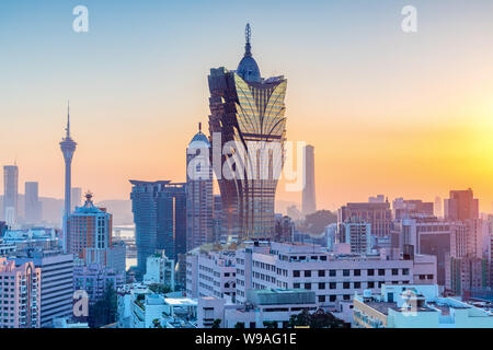 Macau, die Skyline der Stadt bei Sonnenuntergang. Stockfoto