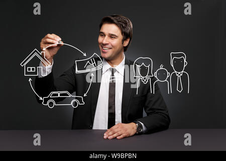 Geschäftsmann zieht Versicherungskonzept Stockfoto