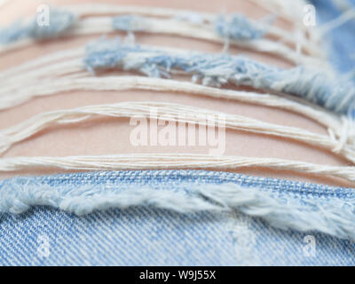 Blue Jeans Mangel, Textil von Jeans, die gesichtshaut von Denim alten Mangel Jeans, jeans Textur Stockfoto