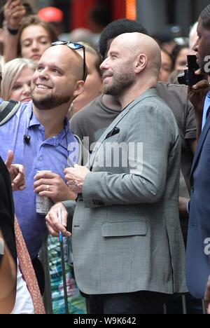 New York, NY, USA. 14 Aug, 2019. John Travolta heraus und über für Celebrity Candids - MI, New York, NY 14. August 2019. Credit: Kristin Callahan/Everett Collection/Alamy leben Nachrichten Stockfoto