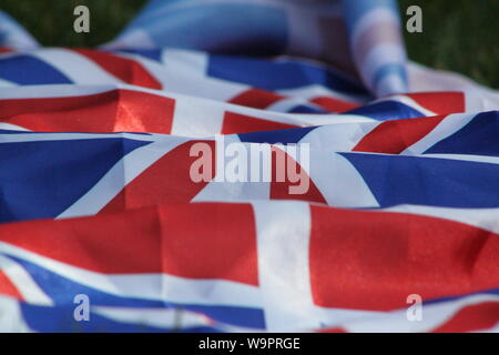 Union Jacks an der Victoria Station, London Stockfoto