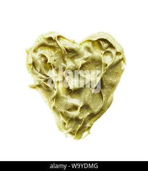 Textur und Anschläge einer Hellgrün organische Maske für Gesicht oder Körper Creme auf weißem Hintergrund Stockfoto