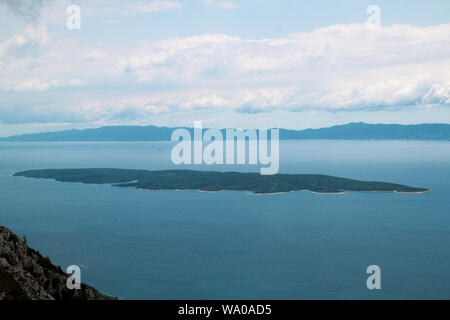 Scedro Island, eine kleine Insel in der kroatischen Halbinsel von der Spitze der Insel Hvar gesehen Stockfoto