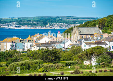 Die charaktervollen Dorf Marazion (St Michael's Mount) mit am Horizont Penzance, Cornwall, England, Großbritannien. Stockfoto