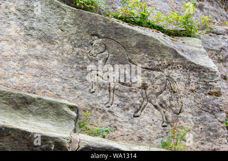 Pferd geschnitzt in Sandstein in sächsischen Elbsandstein gebirge Berge Stockfoto