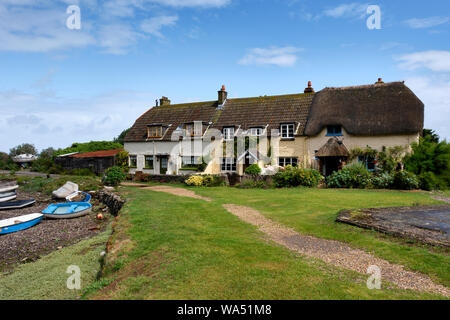 Cottages am Kai in Porlock Wehr, in der Nähe von MInehead, Someset Stockfoto