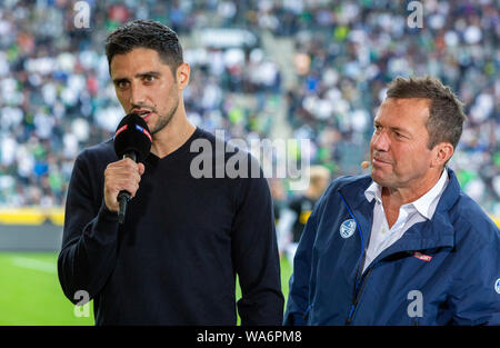 Sport, Fußball, Bundesliga, 2019/2020, Borussia Mönchengladbach gegen FC Schalke 04 0-0, Stadion Borussia Park, Spieler Lars Stindl (MG) links von Sky Experte Lothar Matthaeus, DFL-Bestimmungen verbieten die Verwendung von Fotografien als interviewt, BILDSEQUENZEN UND/ODER QUASI-VIDEO Stockfoto