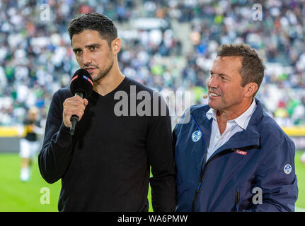 Sport, Fußball, Bundesliga, 2019/2020, Borussia Mönchengladbach gegen FC Schalke 04 0-0, Stadion Borussia Park, Spieler Lars Stindl (MG) links von Sky Experte Lothar Matthaeus, DFL-Bestimmungen verbieten die Verwendung von Fotografien als interviewt, BILDSEQUENZEN UND/ODER QUASI-VIDEO Stockfoto