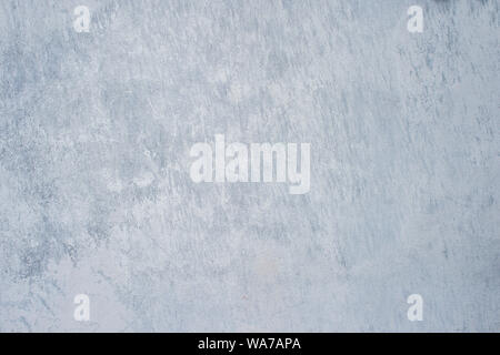 Eine graue Betonwand mit weißem Putz durchsetzt. Hintergrund. Stockfoto