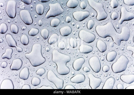Wassertropfen auf Glas Stockfoto