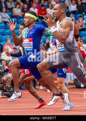 Michael Rodgers der Vereinigten Staaten und Yohan Blake von Jamaika in Aktion während der Männer 100 m (Heat2), während die Birmingham 2019 Müller Grand Prix, am Alexander Stadium, Birmingham. Stockfoto