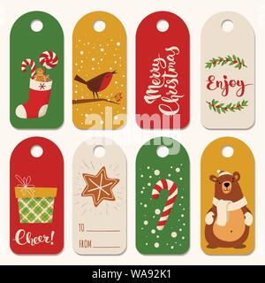 Tags und Etiketten für die Weihnachtsferien mit Symbolen und Schriften. Stock Vektor