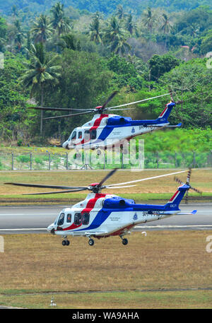 Langkawi, Malaysia - Mar 31, 2019. Königliche malaysische Polizei AgustaWestland AW139 nehmen - weg vom Flughafen Langkawi (Lgk). Stockfoto