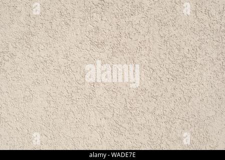 Beige Stuck Wand, Textur Detail Nahaufnahme. Stockfoto