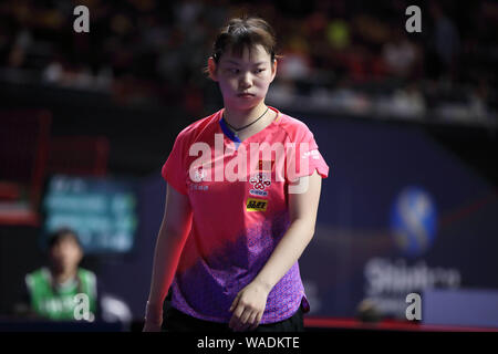 Er Zhuojia China reagiert, als er gegen Ding Ning China in der ersten Runde der Frauen Singles konkurriert während der SHINHAN BANK Korea Open in der Stockfoto