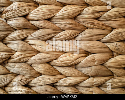 Hellbraun stark strukturierten Zusammenfassung Hintergrund Der raffia Korb Stockfoto
