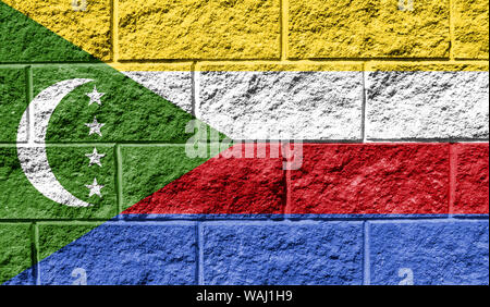 Flagge Komoren close up malte auf eine gerissene Wand Stockfoto