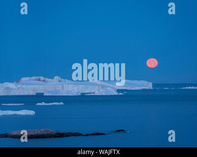 Vollmond. Ilulissat Icefjord Ilulissat Kangerlua kangia oder auch an der Diskobucht genannt. Die icefjord ist als UNESCO-Weltkulturerbe. Stockfoto