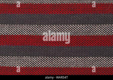 Rot, Grau und Weiß Gestreifte Wolltuch flach. Textur Detail Nahaufnahme. Stockfoto