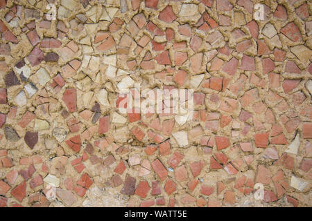 Haus Wand der gebrochenen Steine - beige Textur, Beton, vintage Exterieur Hintergrund Stockfoto