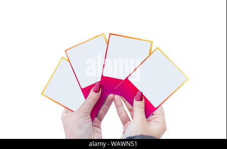 Girl holding Foto square Frames, Stifte und Papier, Aufkleber isoliert Stockfoto