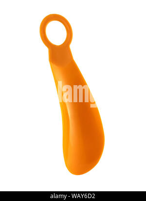 Orange Schuhlöffel isoliert auf weißem Hintergrund. Es ist kleine Löffel. Sie können ihre Schuhe auf komfortabel. Stockfoto