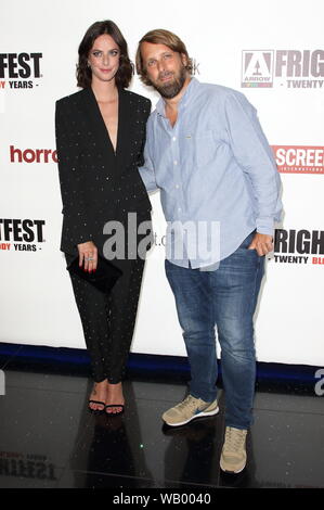 Regisseur Alexandre Aja und Hauptdarstellerin Kaya Scodelario besuchen das Screening von Kriechen auf der öffnung Nacht des FrightFest 2019 im Cineworld Imperium, Leicester Square in London. Stockfoto