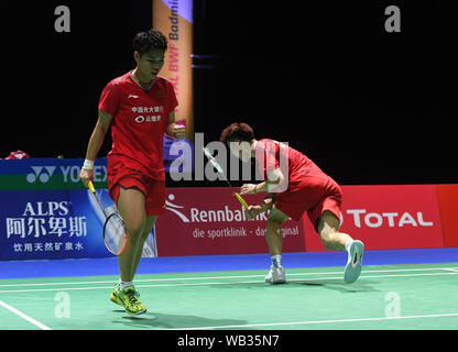 Basel, Schweiz. 23 Aug, 2019. Wang Yilyu/Huang Dongping (L) von China feiern nach dem gemischten Doppel Viertelfinale Spiel gegen Tang Chun Mann/Tse-Ying Suet von China Hong Kong auf der BWF Badminton World Championships 2019 in Basel, Schweiz, 23.08.2019. Credit: Li Jundong/Xinhua/Alamy leben Nachrichten Stockfoto