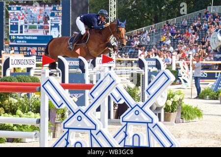 Rotterdam, die Niederlande. 23 Aug, 2019. Schweden Peder Fredricson auf H&M alles In führt während der FEI Jumping Europameisterschaft in Rotterdam, Niederlande, 23.08.2019. Quelle: Sylvia Lederer/Xinhua/Alamy leben Nachrichten Stockfoto