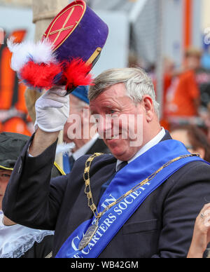 Irvine, UK. 24. August 2019. Von Irvine Marymass Festival ist ein historisches Ereignis, das als mittelalterliche Horse Show begann und ist jetzt der größte Festival im Westen von Schottland zieht über 20.000 Besucher jährlich. Diese historische Festzug durch "Die Irvine Carters 'Gesellschaft', die zuerst für Unternehmen und gemeinnützige Zwecke gebildet wurde, und kann seine Ursprünge zurück bis 1753 Trace organisiert. Bild von DANNY KERR aus Irvine, der Kapitän der Carters für 13 Jahre gewesen. Credit: Findlay/Alamy leben Nachrichten Stockfoto