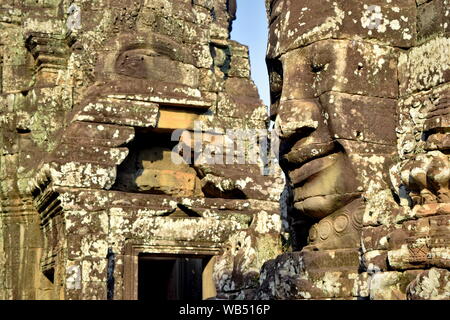 Buddha Gesichter auf antiken Tempel Türme des Bayon, Angkor Thom, Kambodscha Stockfoto