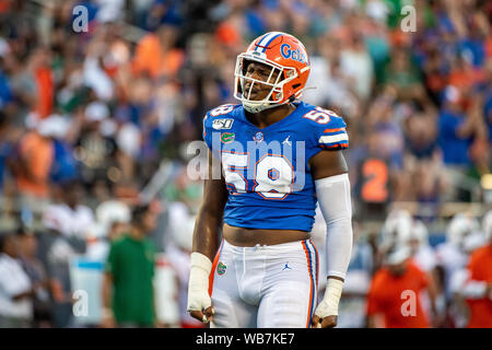 Orlando, Florida, USA. 24 August, 2019. Florida Gators Linebacker Jonathan Greenard (58) Während der ersten Hälfte der Camping Welt Kickoff zwischen Miami und Florida Gators im Camping Welt Stadion in Orlando, Fl. Romeo T Guzman/CSM Credit: Cal Sport Media/Alamy leben Nachrichten Stockfoto